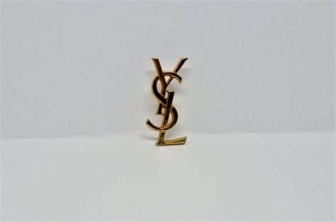 pins yves saint laurent|saint laurent brooch pins.